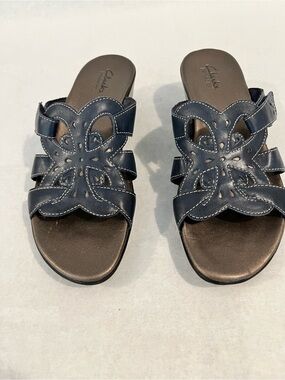 Clarks Navy Floral Cutout Leather Slide Sandals